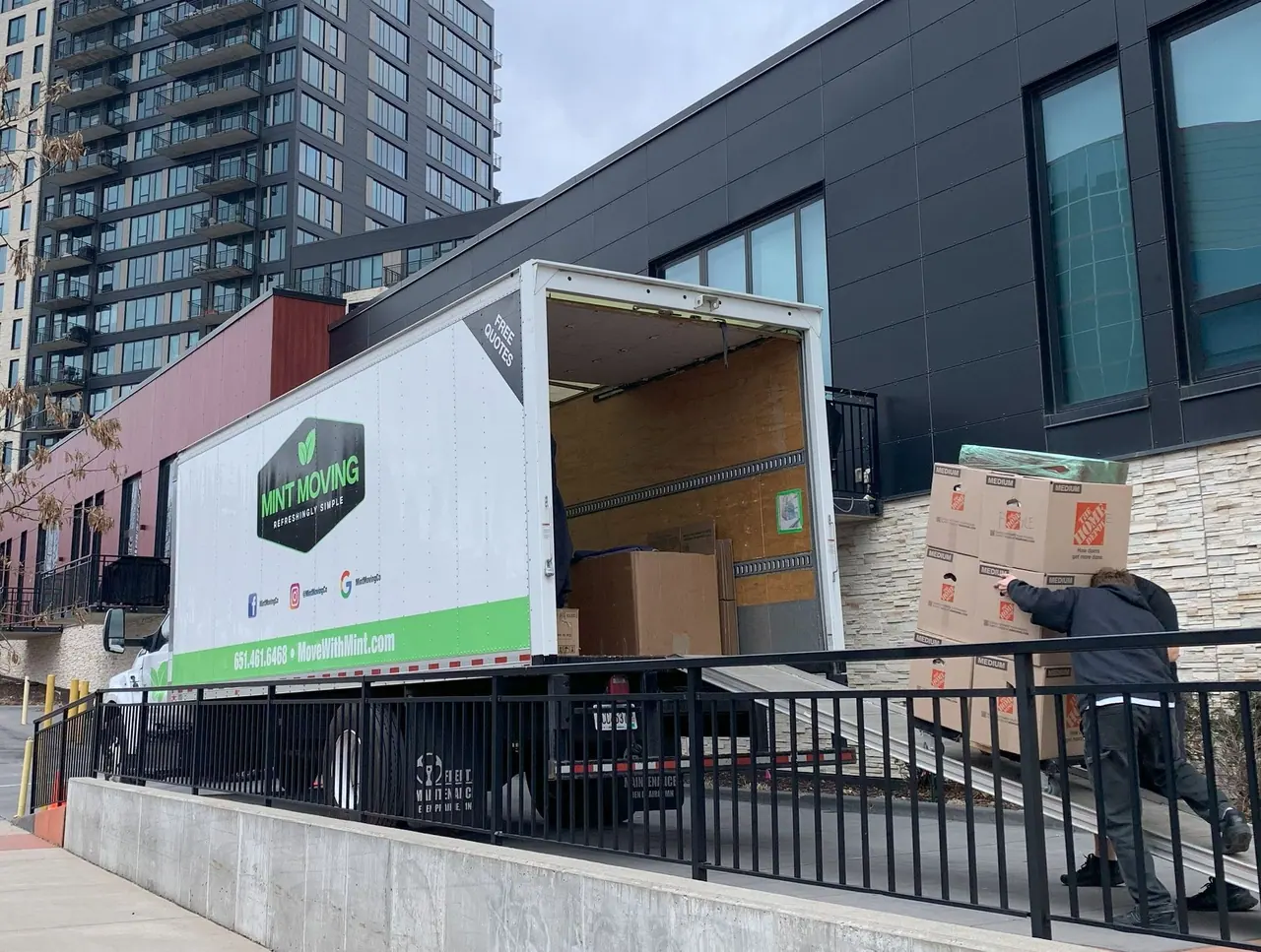 Mint Moving truck staged for a tight access moving route